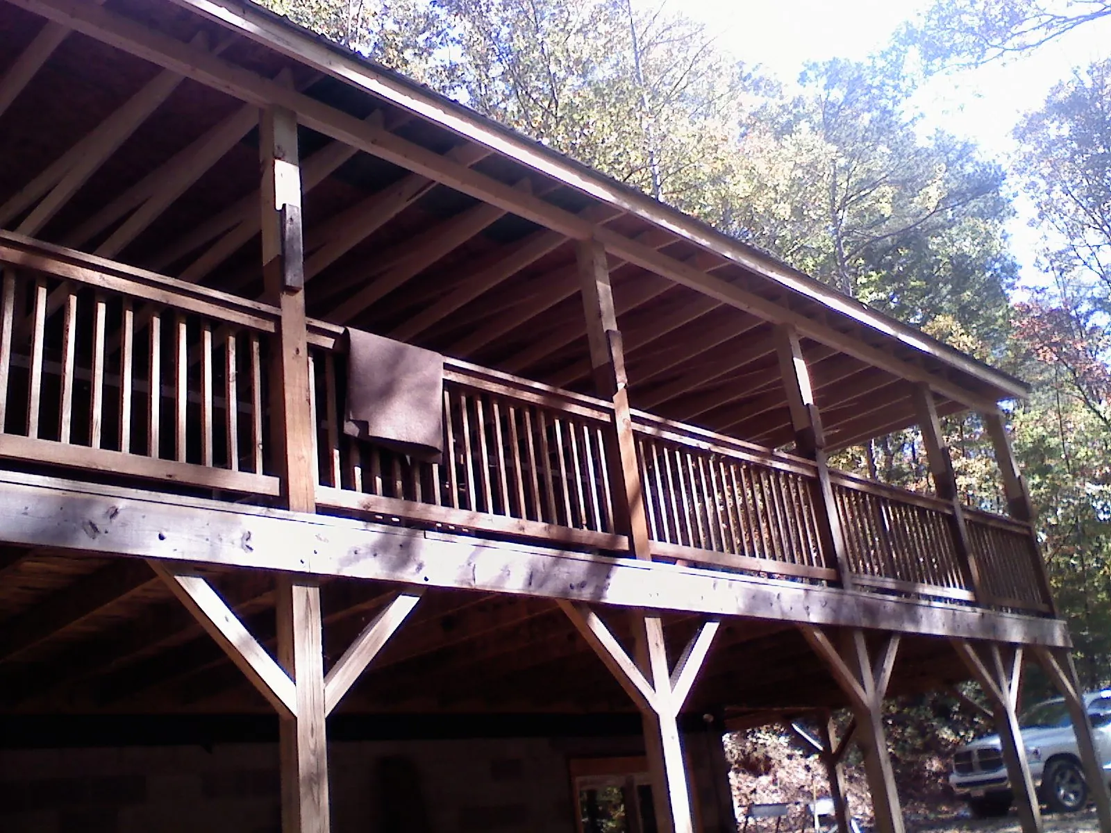 Timber framing under a new elevated porch and deck — Roof Leak Repair in Phenix City by Roofing Brothers